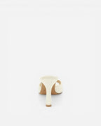 NOU ivory satin mule heels with a sculpted heel, handmade in Portugal. Perfect bridal shoe.