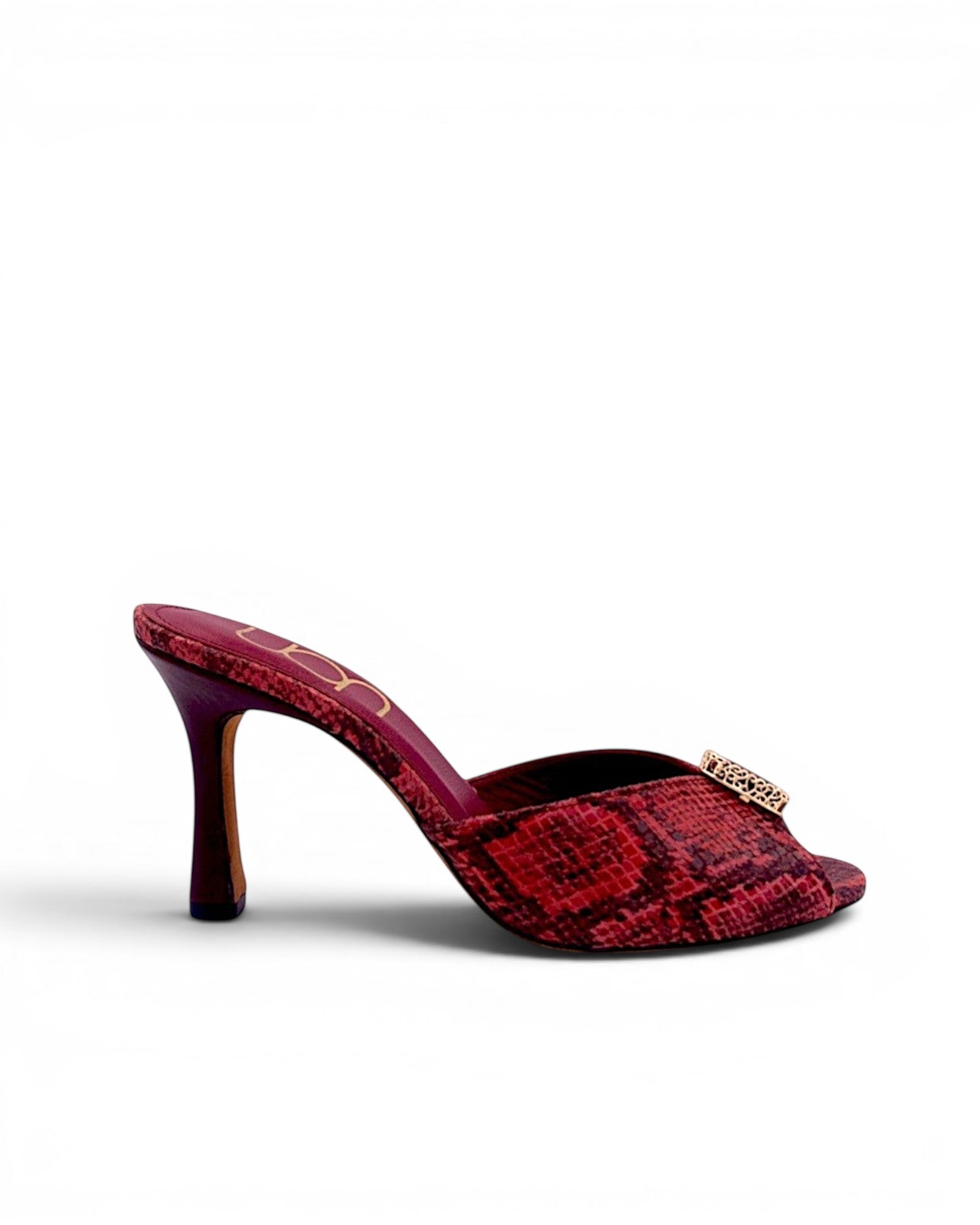 NOU red snakeskin leather mule heels with ruby gemstone accent and stiletto heel.