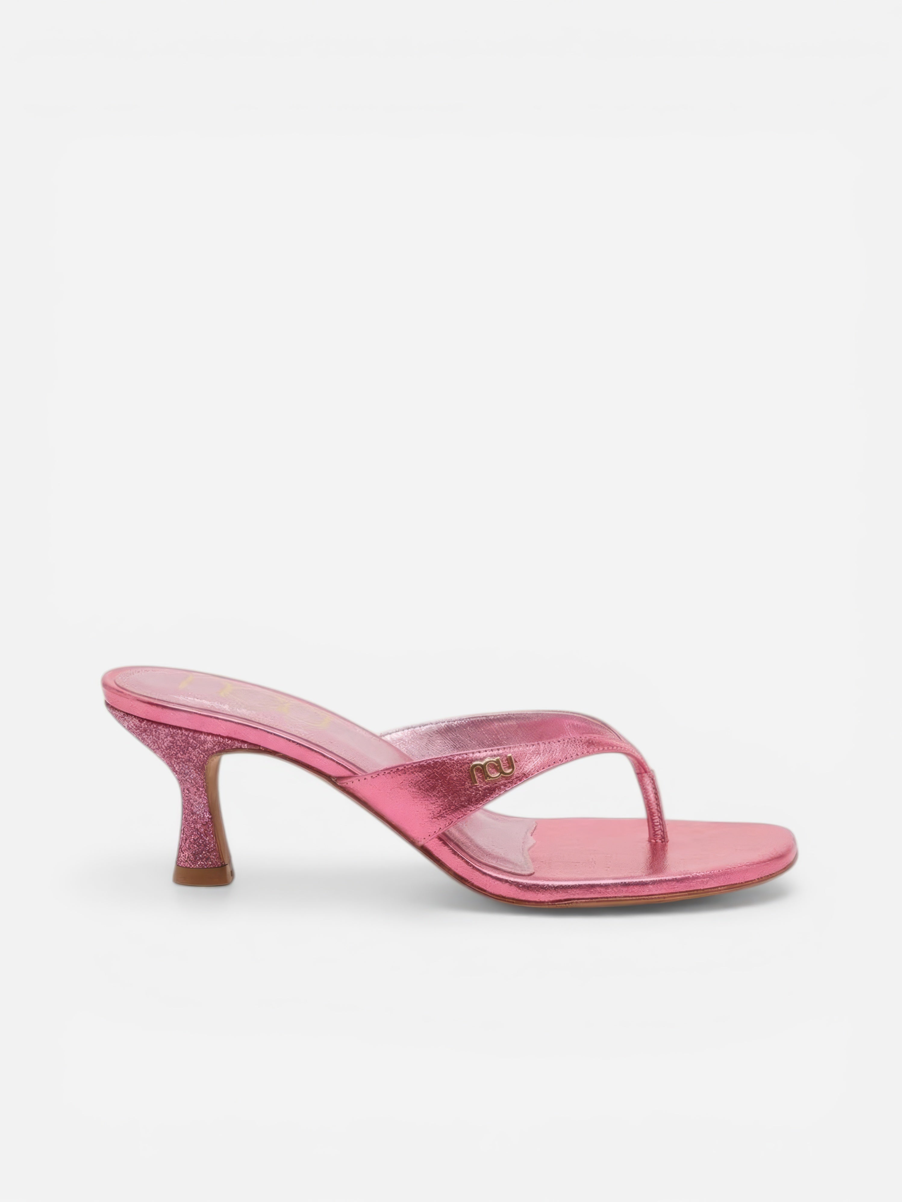 Pink high-heeled sandal on a white background