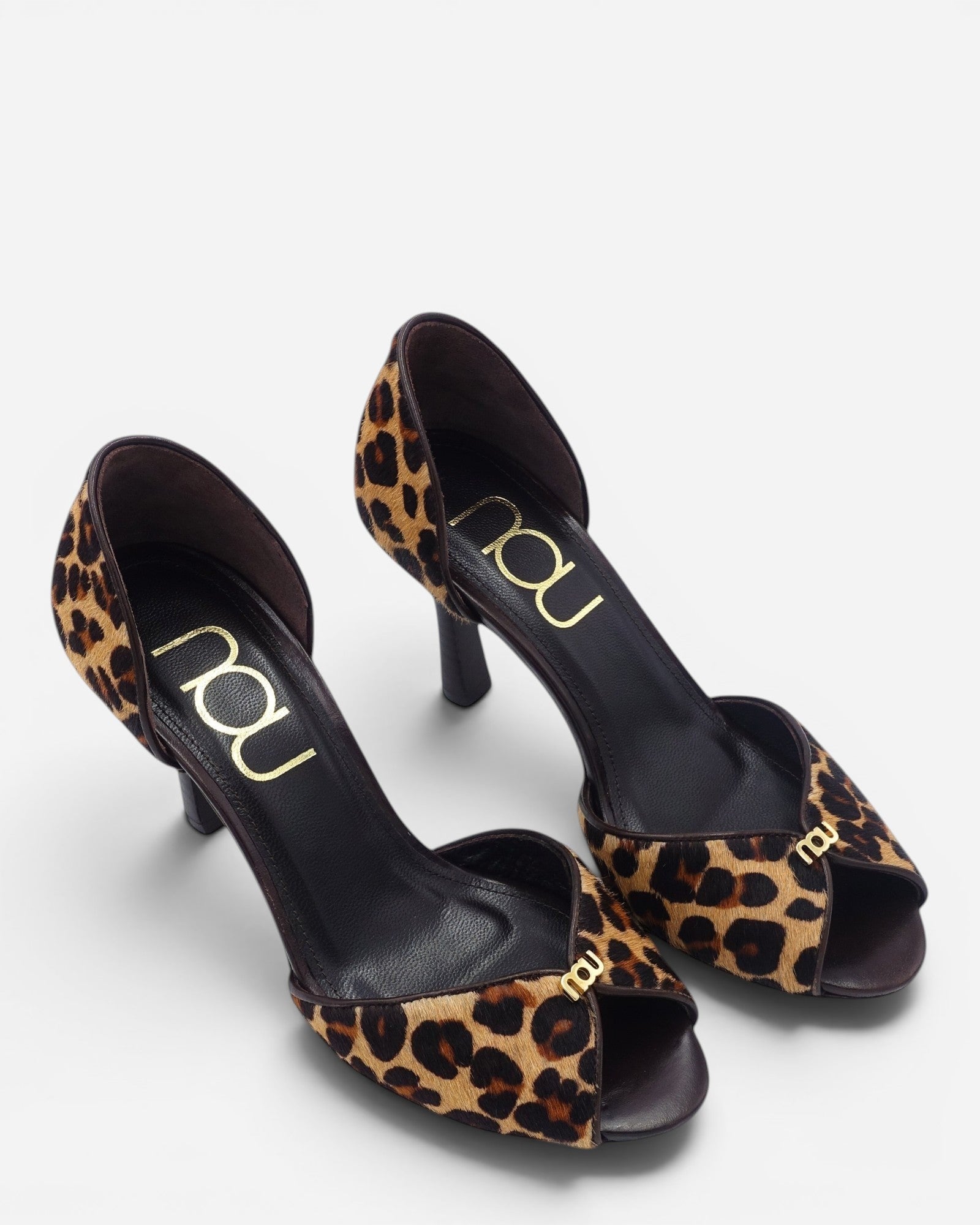 a pair of The Pump in Leopard by NOU, NOU SHOES by alexia ioannou