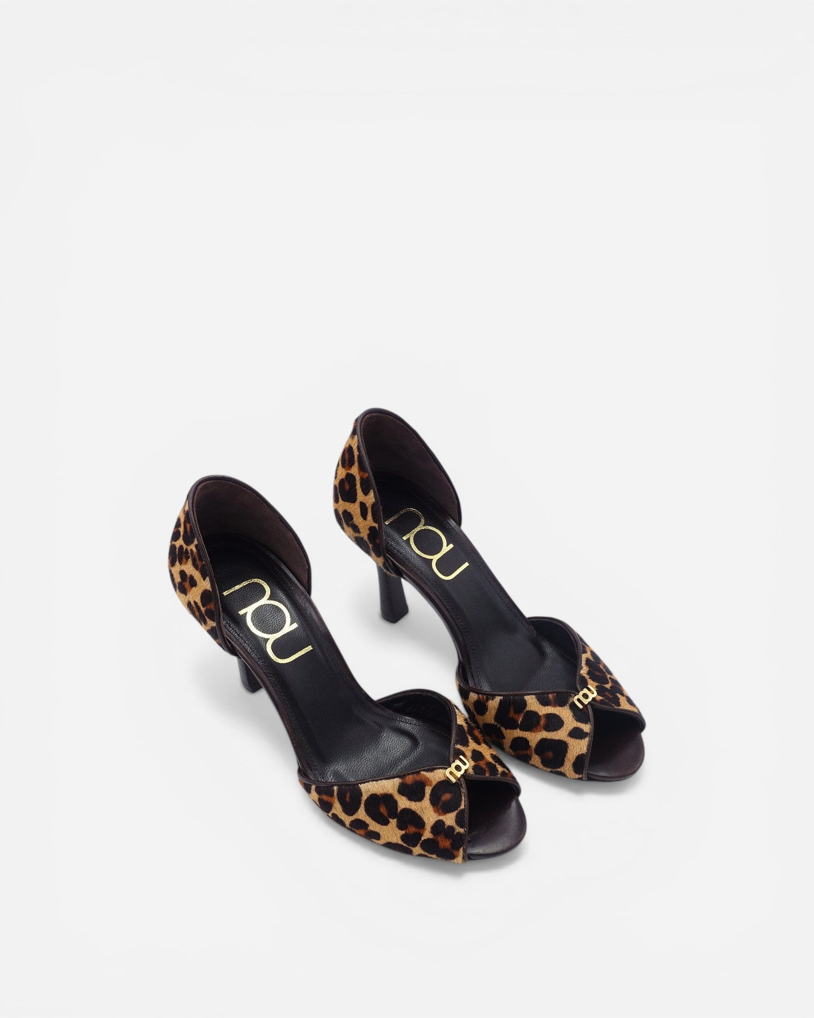 a pair of The Pump in Leopard by NOU, NOU SHOES by alexia ioannou