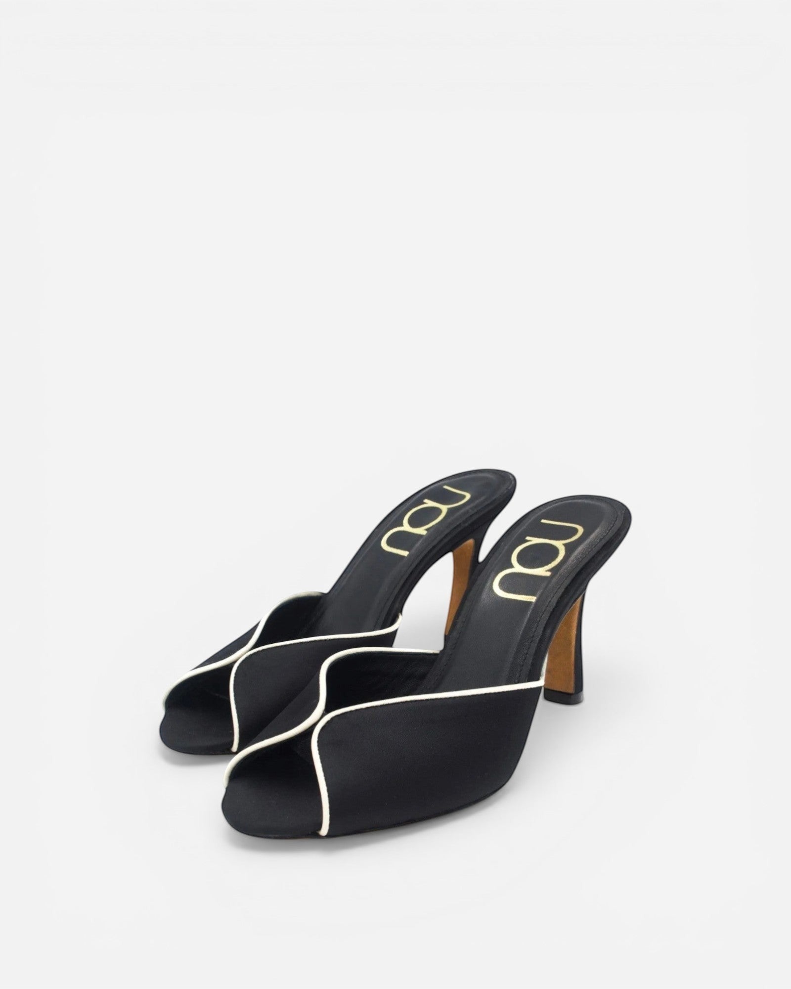 NOU black Italian satin classic mule heels with cream trim and open toe.