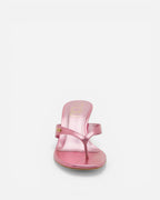 Pink sandal with a clear heel on a white background