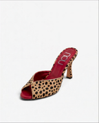 NOU The Mule in cheetah print ponyhair with a vibrant merlot red insole and stiletto heel