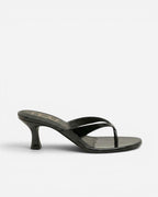 NOU The Kitty black patent leather kitten heel thong sandal with a 1.5 inch sculpted heel and padded insole.