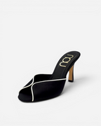 NOU black satin mule with cream leather trim and a 3-inch heel, featuring a padded insole and open-toe design.