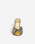 NOU The Mule in dalmatian print ponyhair with a metallic gold insole and open-toe design