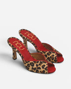 NOU leopard print ponyhair mule heels with red lining and peep toe.