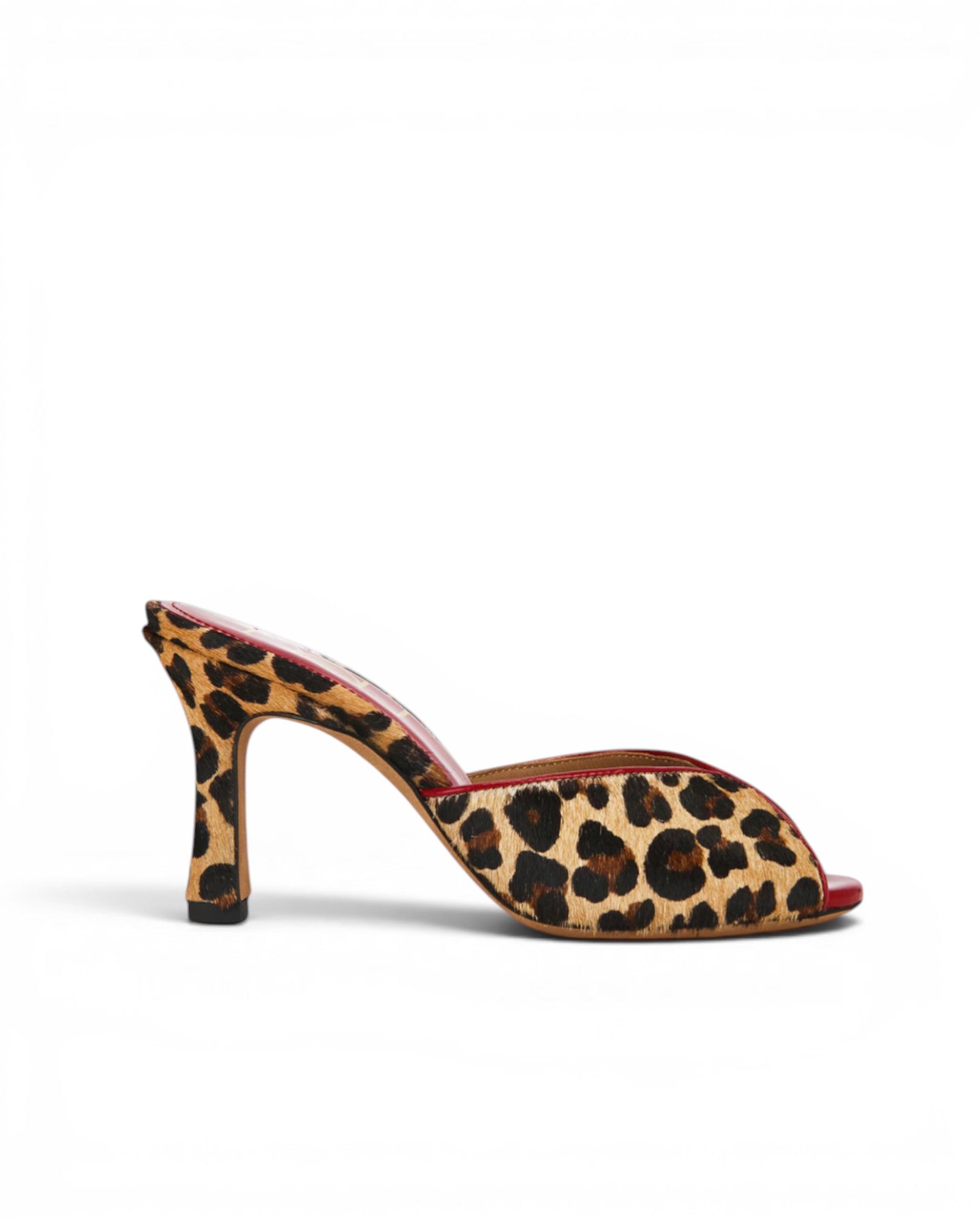 NOU leopard print ponyhair mule with red trim and a sculpted heel.