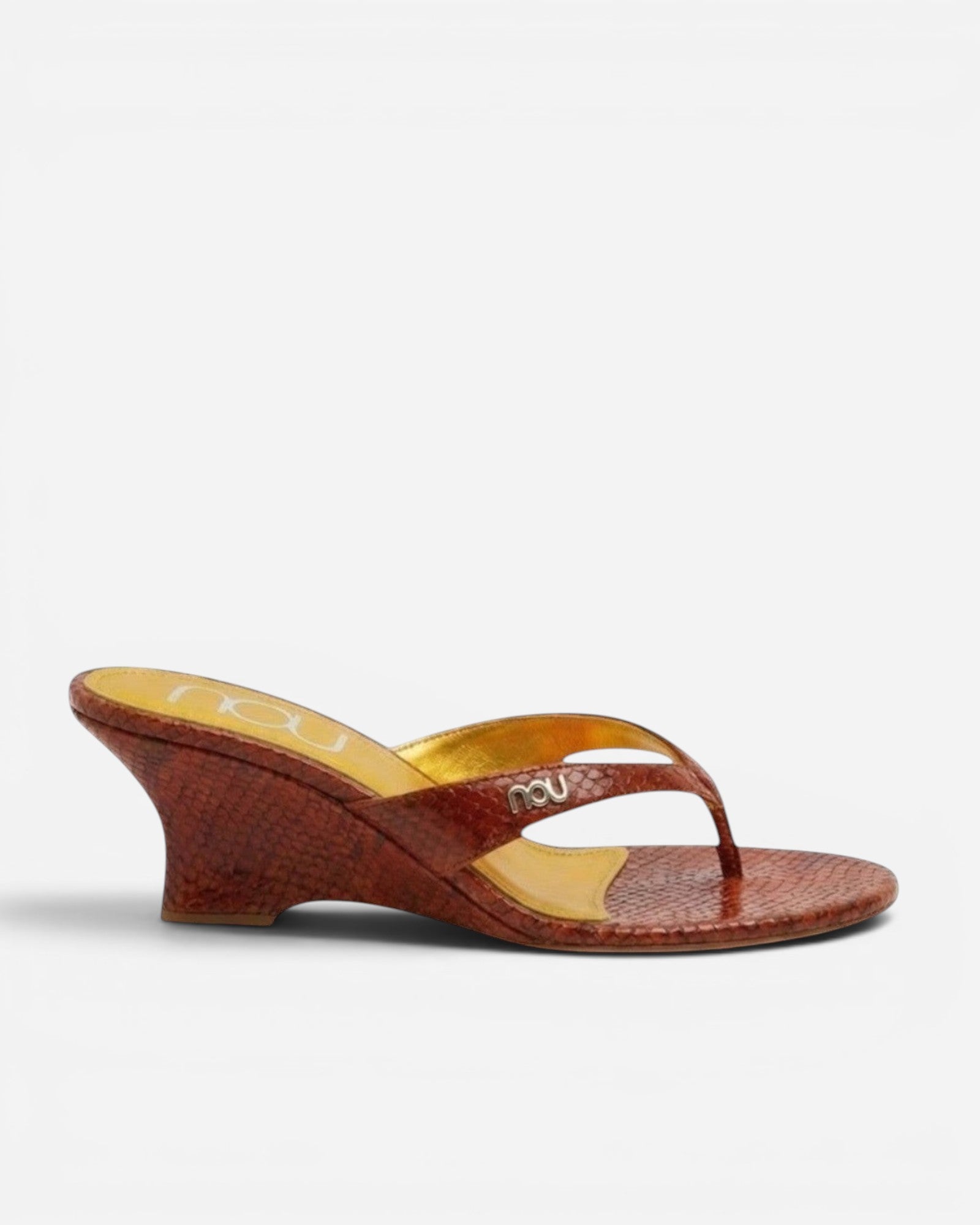 NOU The Puff Wedge in blood orange snakeskin with a 3-inch sculptural heel and marigold cushioned insole.