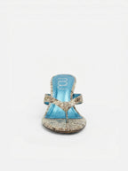 NOU The Puff Wedge thong sandals in snakeskin with a 3" sculptural wedge heel and blue insole.