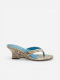 NOU women's silver snakeskin wedge sandals with blue insole and puffed straps. 3" heel.