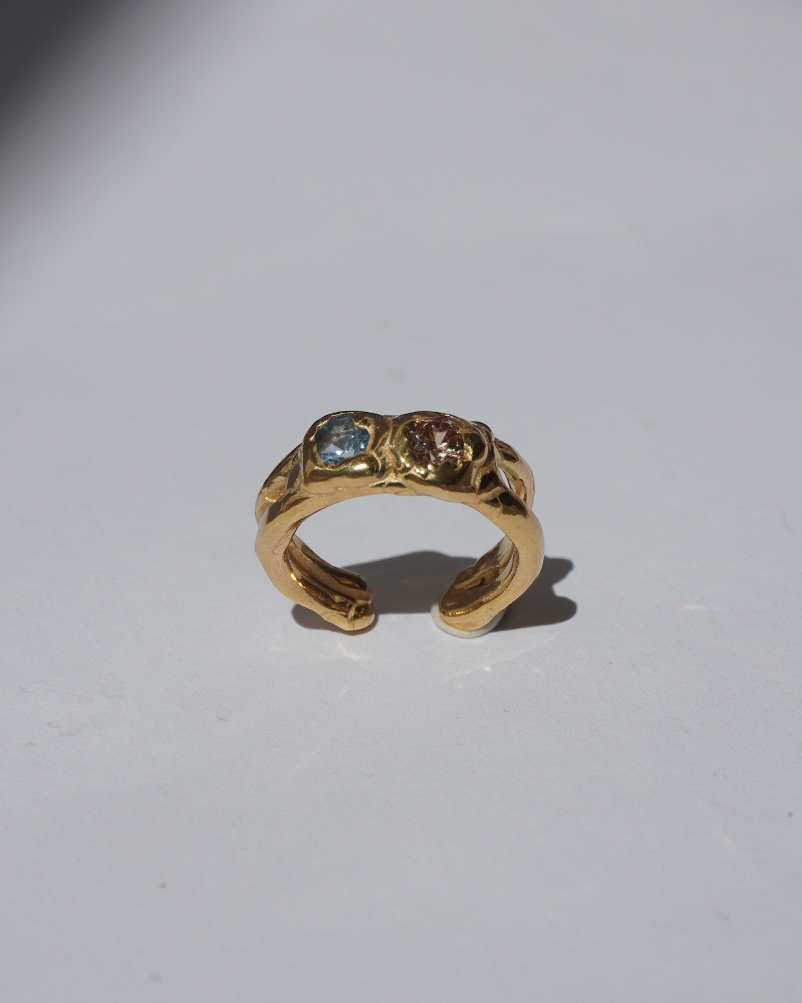 NOU Sirena Double Trouble adjustable toe ring in 24K gold-plated sterling silver with two small inset gemstones.