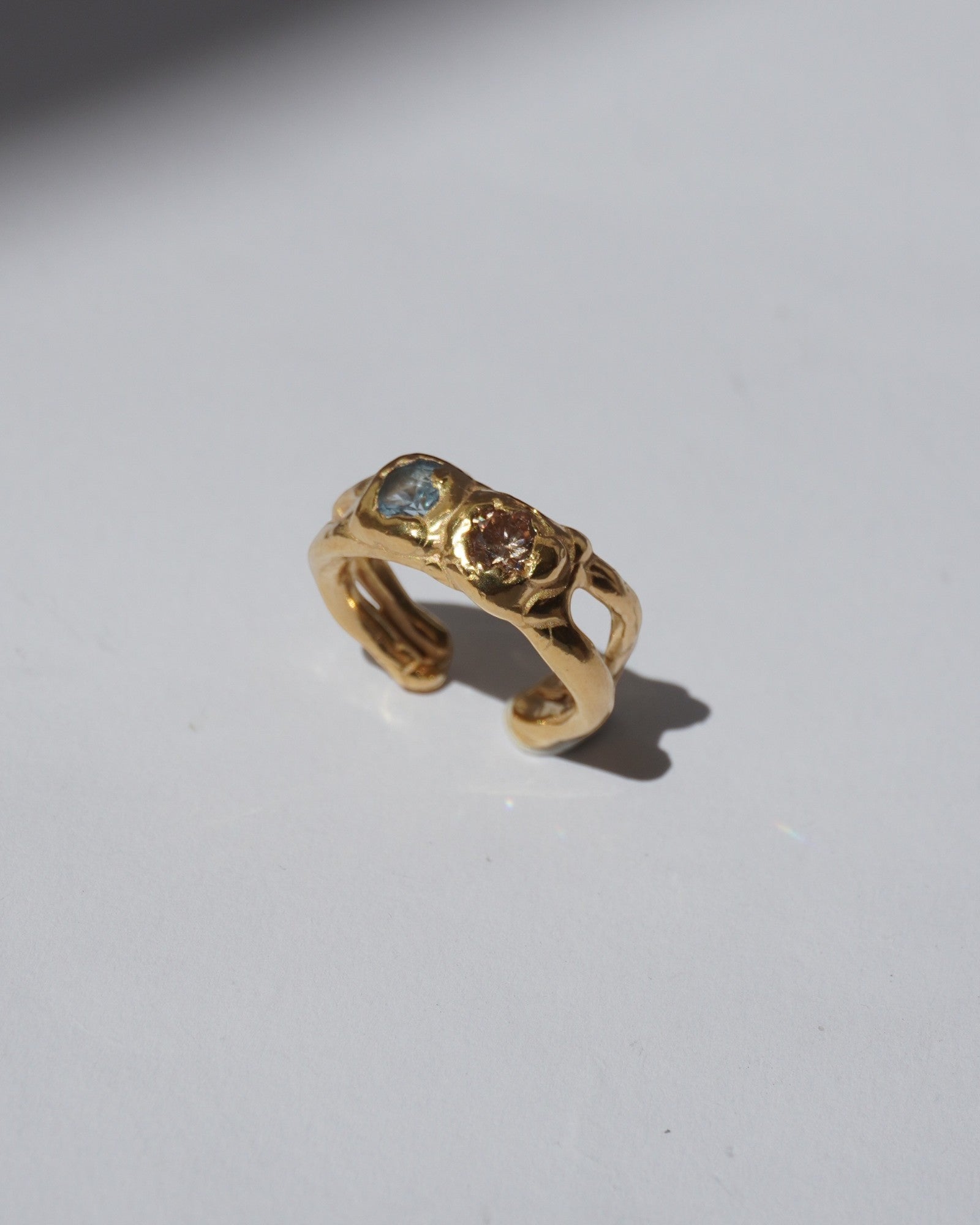 NOU Sirena Double Trouble adjustable toe ring in 24K gold-plated sterling silver with two small inset gemstones.