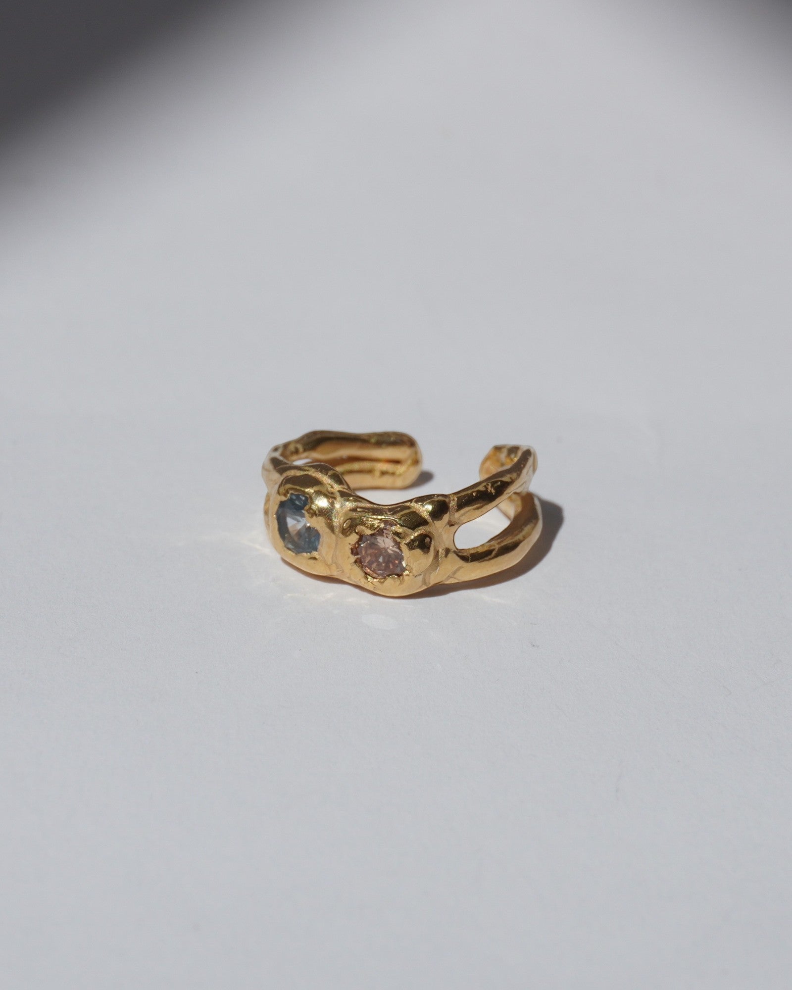 NOU Sirena Double Trouble adjustable toe ring in 24K gold-plated sterling silver with two small inset gemstones.