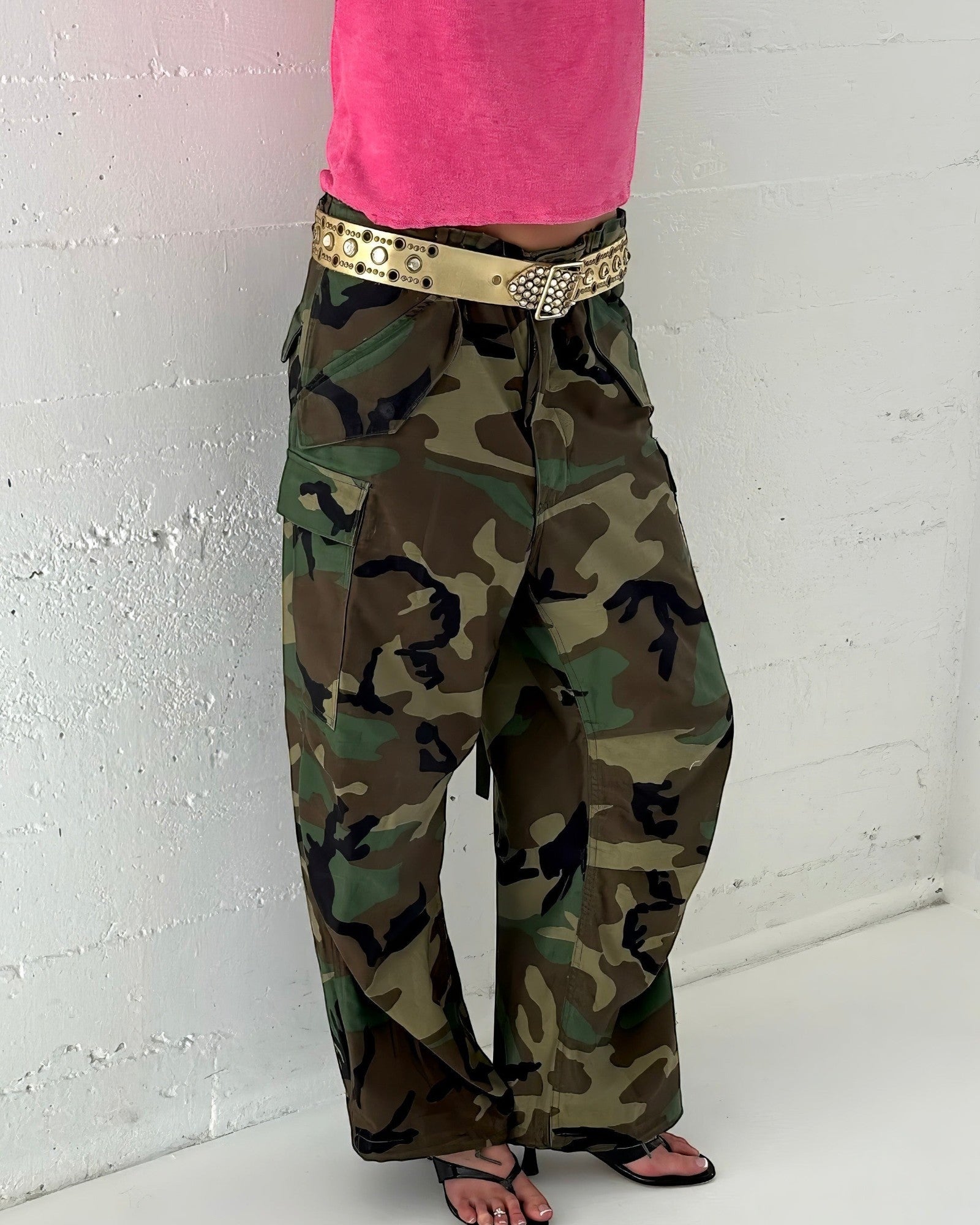 NOU The Kitty patent black licorice sandals with 1.5-inch heel and sculpted straps worn with camouflage cargo pants