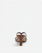 NOU The Kitty kitten heel sandal in chocolate brown snakeskin finish with a metallic purple insole and gold logo.