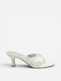 NOU The Kitty white kitten heel thong sandal with sculpted straps and a padded insole for comfortable all-day wear.