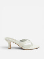 NOU The Kitty white kitten heel thong sandal with sculpted straps and a padded insole for comfortable all-day wear.