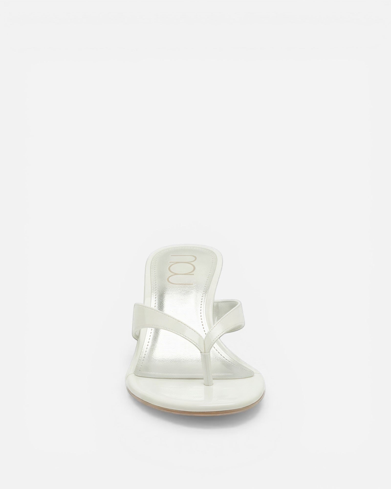 NOU The Kitty white coconut kitten heel sandal with sculpted straps and a comfortable padded insole.