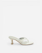 NOU The Kitty white kitten heel thong sandal with a sleek minimalist design and silver insole