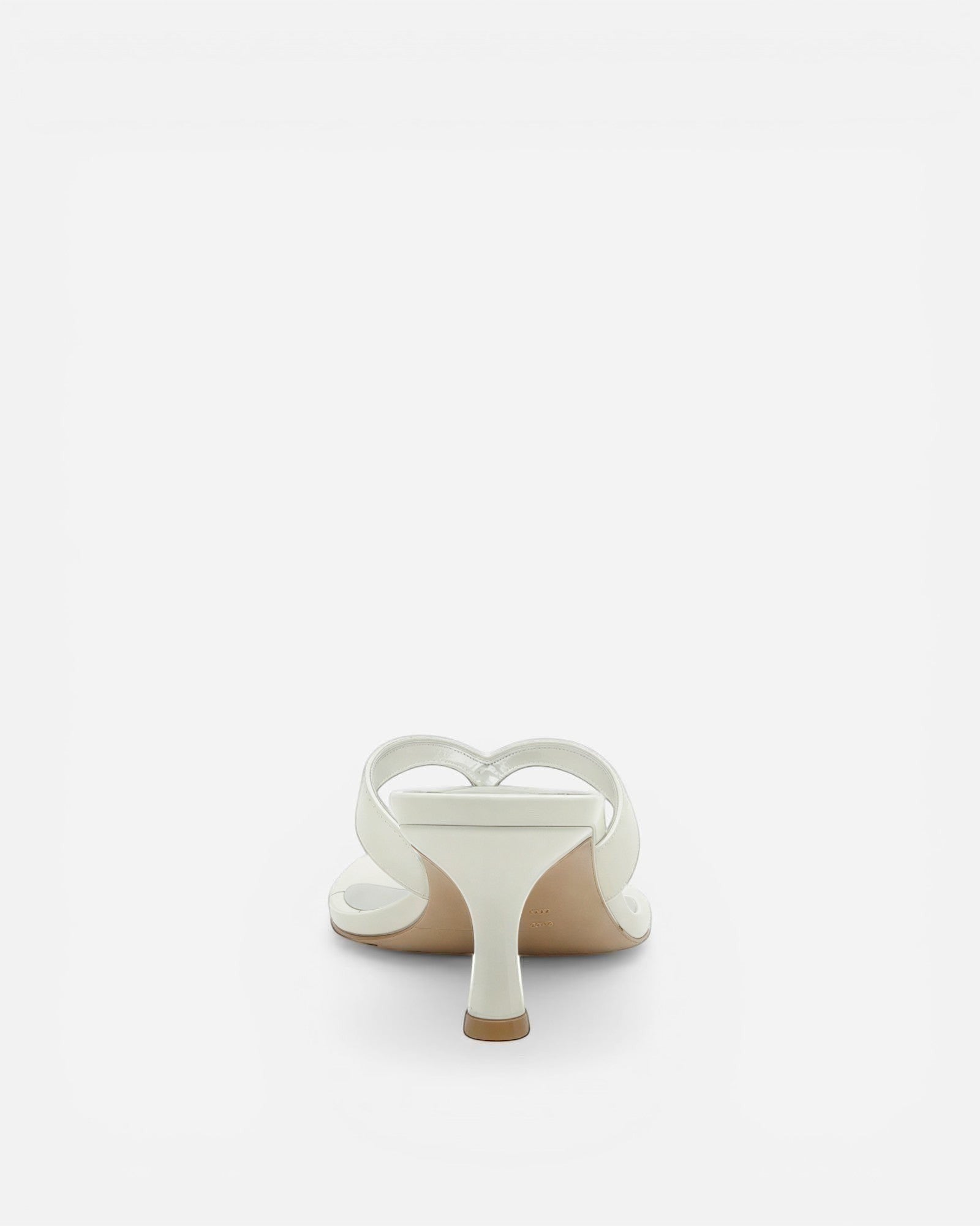 NOU The Kitty white kitten heel sandal with sculpted straps and a 1.5-inch heel, back view.