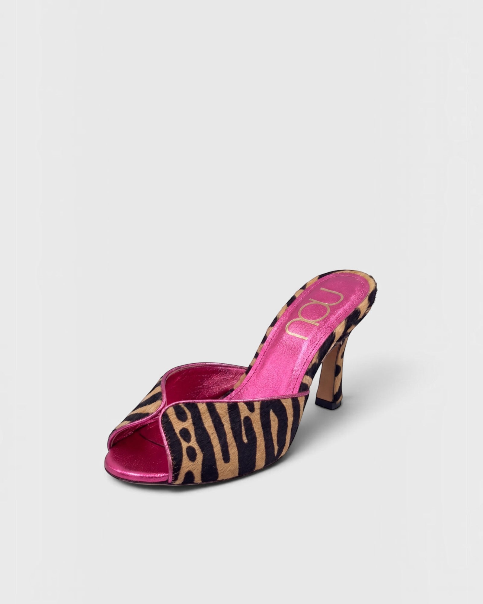 NOU The Mule in tiger print ponyhair with a metallic pink insole and high heel