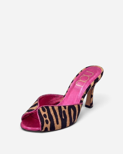 NOU The Mule in tiger-print ponyhair with a metallic pink insole and open-toe stiletto heel design.