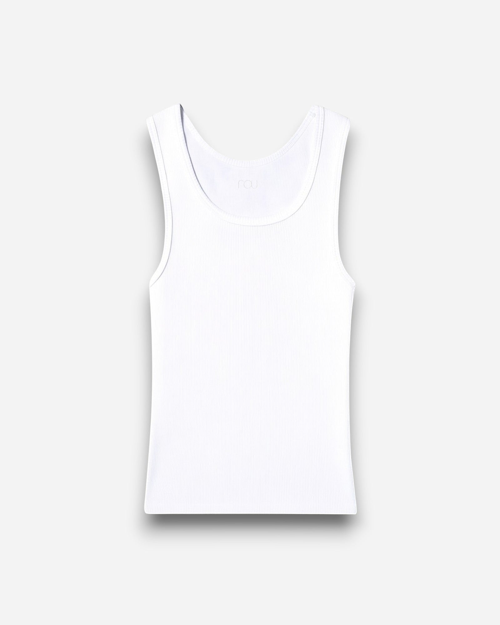 NOU white ribbed cotton tank top with raw hem. A versatile closet staple.