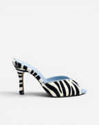 NOU black and white zebra print ponyhair mule with light blue lining and stiletto heel.