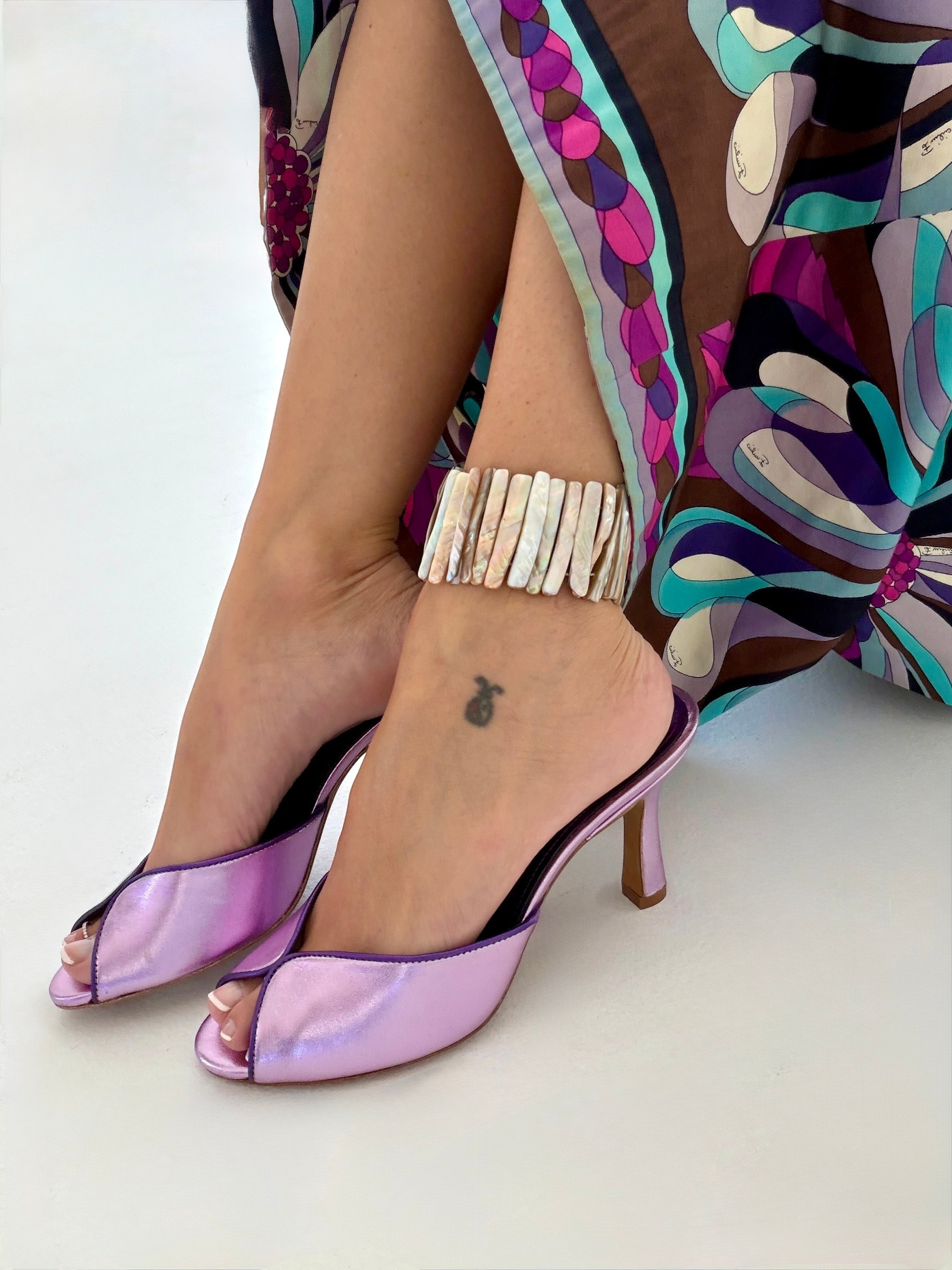 NOU ultraviolet metallic purple leather mule heels with peep toe and stiletto heel. Limited edition.