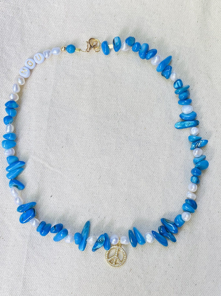 BLUE WATER PEARL PEACE NECKLACE